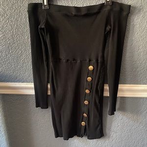 Over the shoulder black dress.